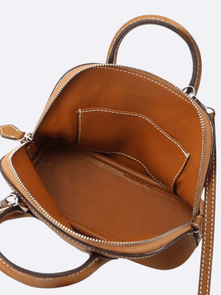 Small leather handbag with shoulder strap<br> Minimi