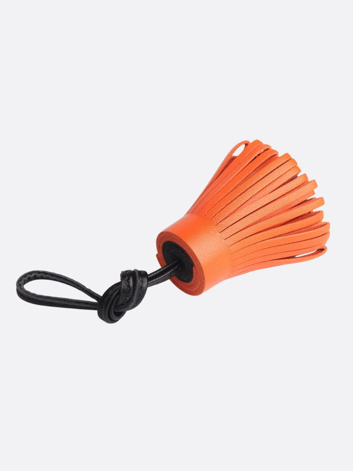 pompon cuir pour sac orange et noir