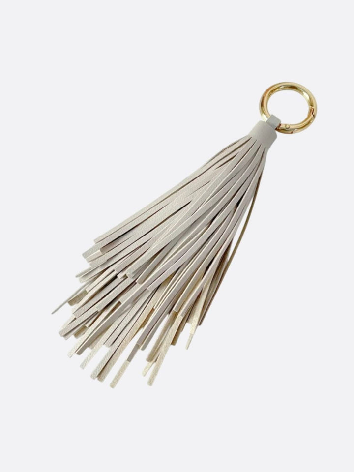 pompon cuir porte clé beige
