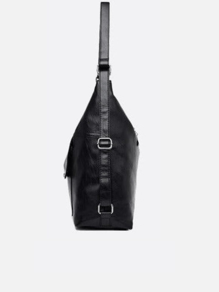 Leather shoulder bag that converts into a backpack<br>Orvane