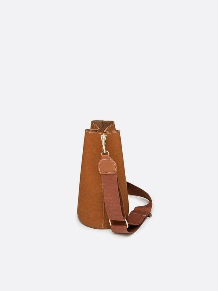 Brushed leather bucket bag<br>Lysandre