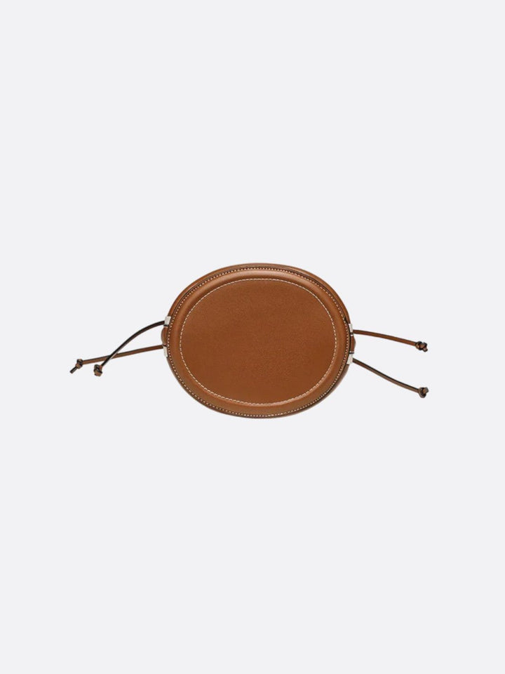 Bucket bag in raffia and leather trim<br>Terra